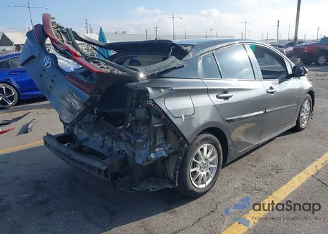 2020 Toyota Prius Prime Limited z USA, uszkodzony, nr VIN JTDKARFP4L3125214